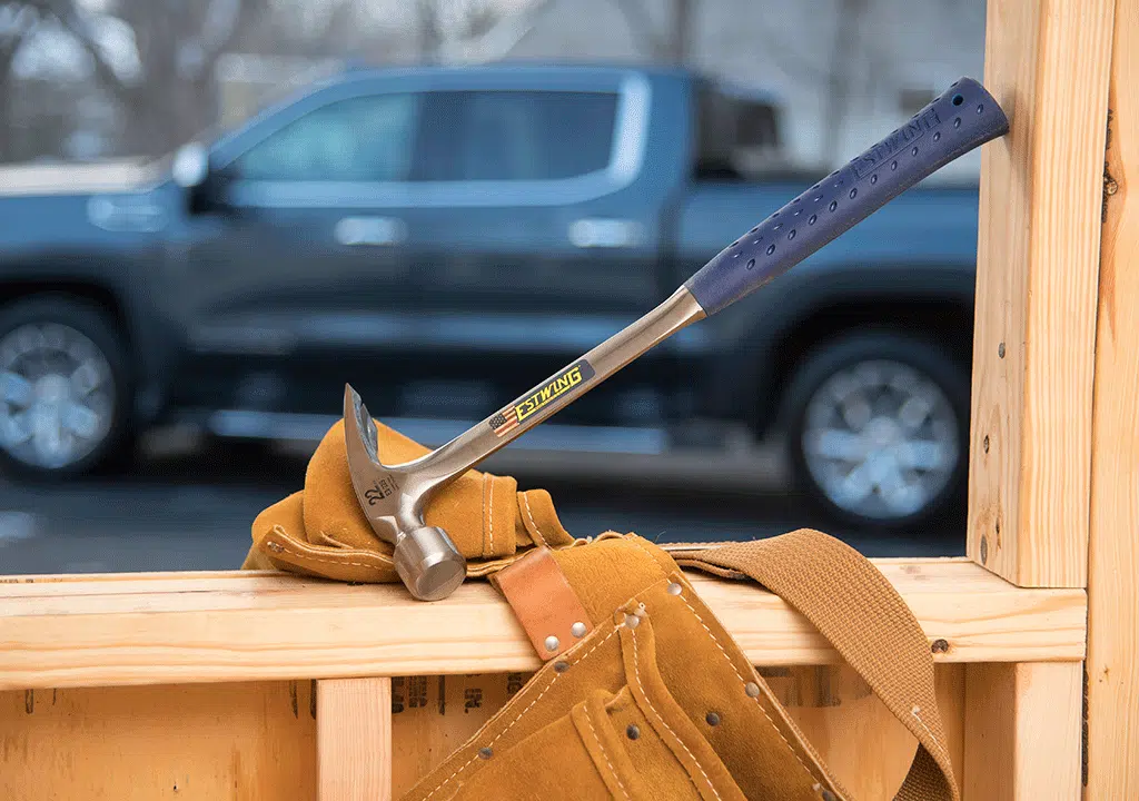 Hammer Leaning on Framed Wall